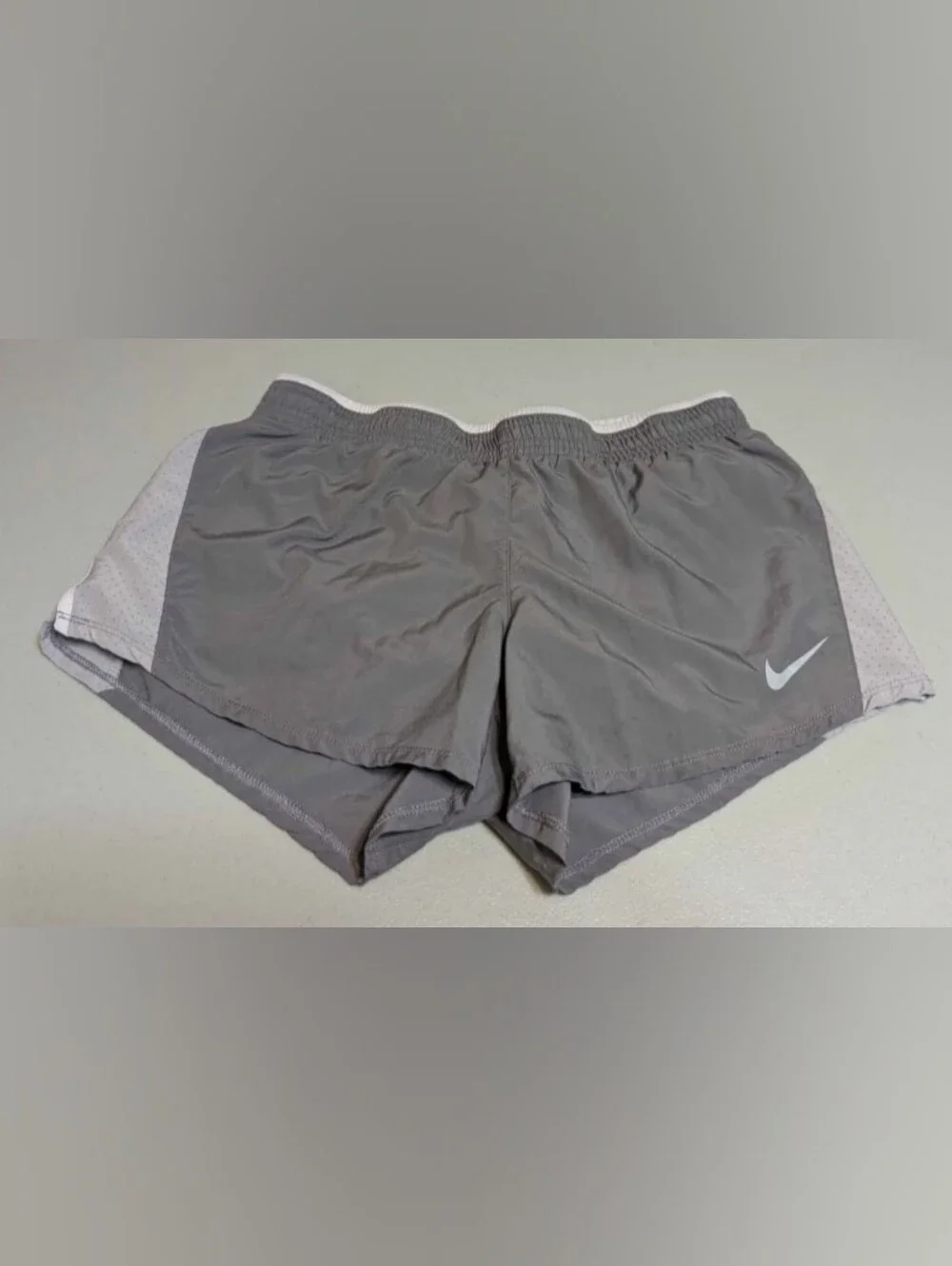 Women's small gray and white Nike shorts